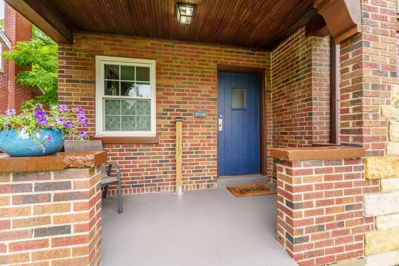 Covered brick entry porch