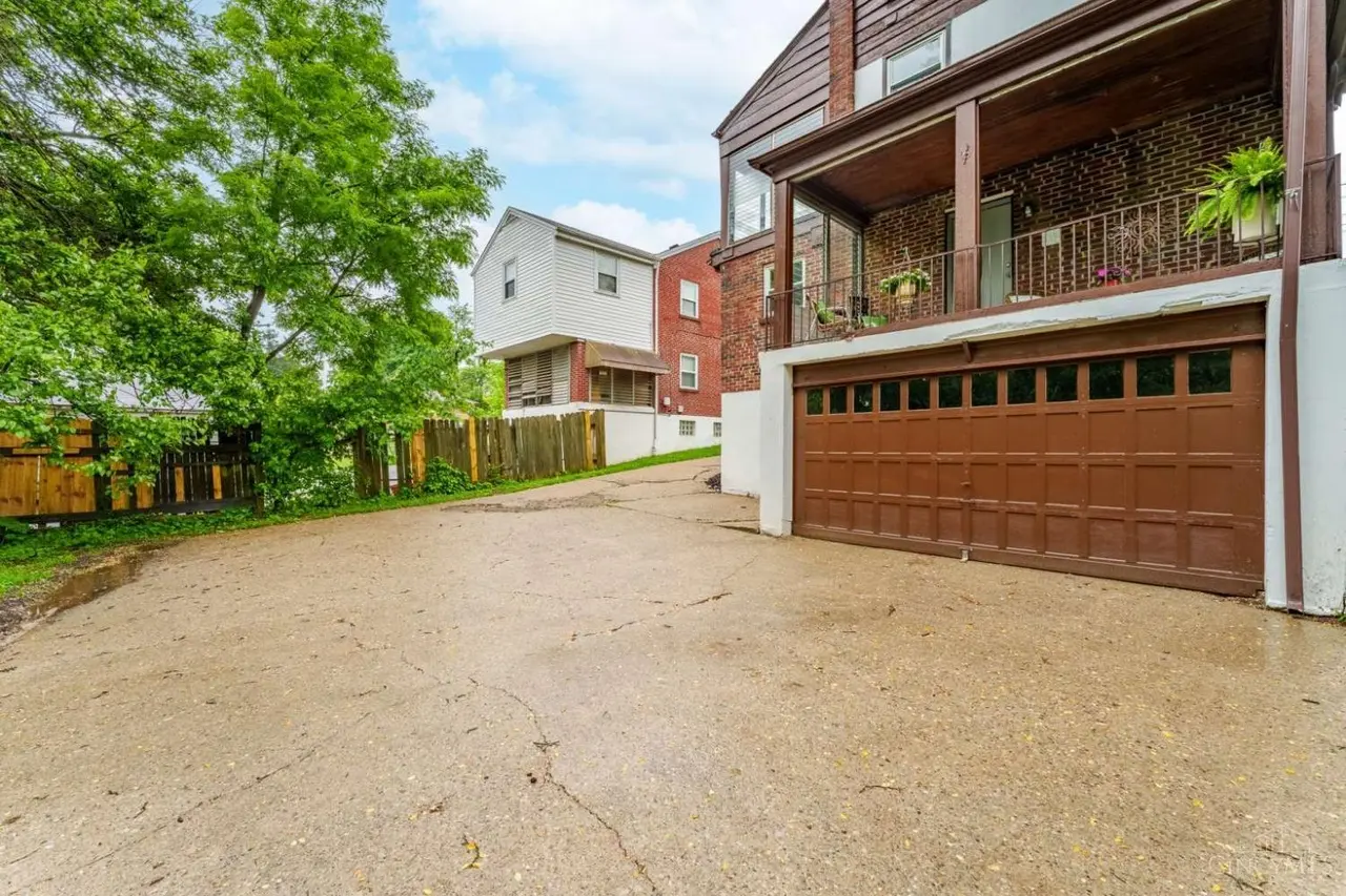 Driveway leading to the detached two-car garage