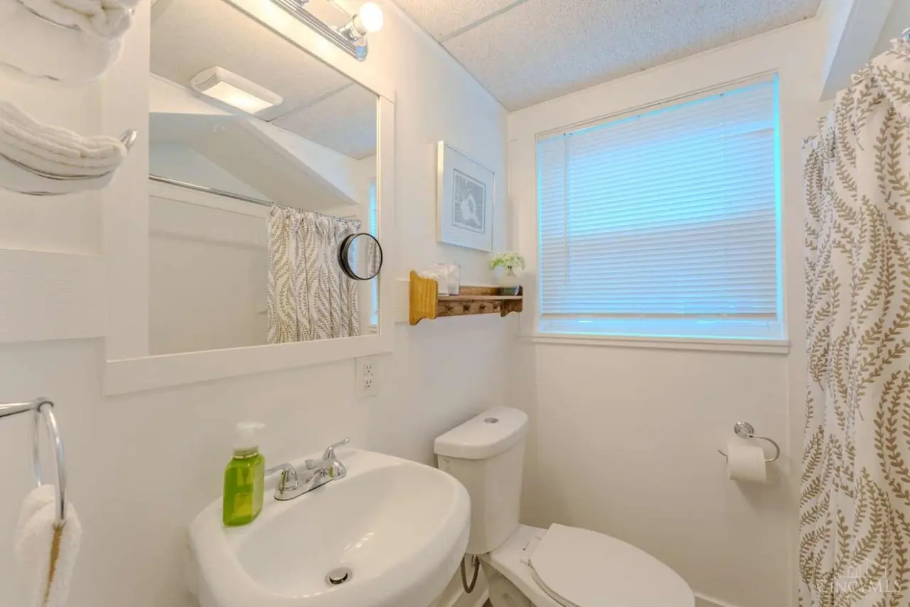 Bathroom with tub and shower