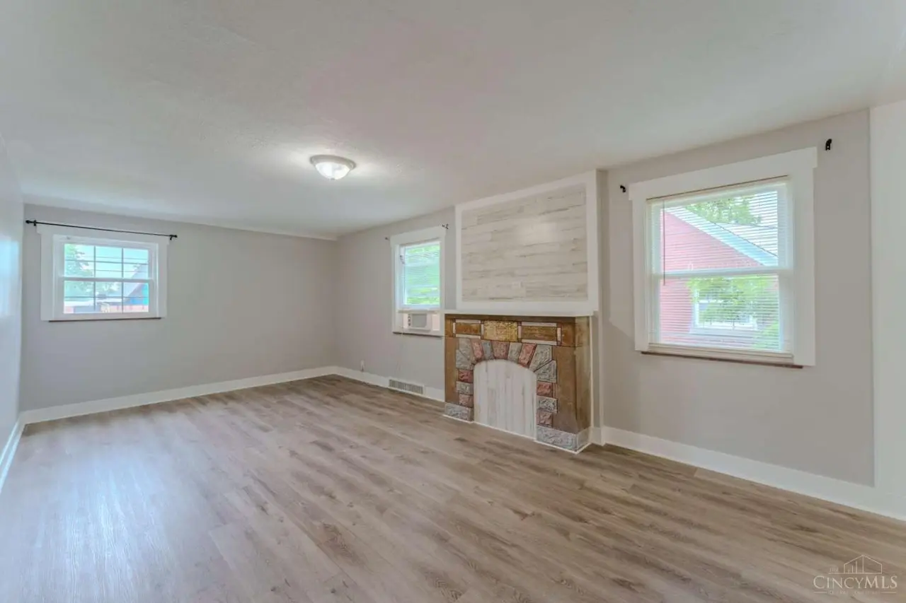Vacant unit living room with updated flooring